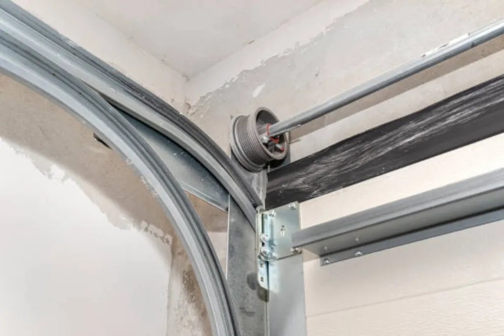 Garage Door Off Track Repair technician at work