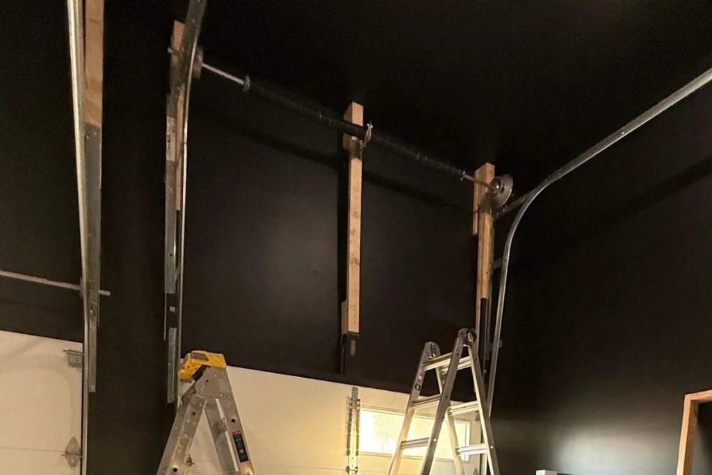 Garage Door Spring Repair & Replacement technician at work